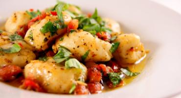 Gnocchi with Pancetta dressed in Garlic, Red Chill and Basil Butter